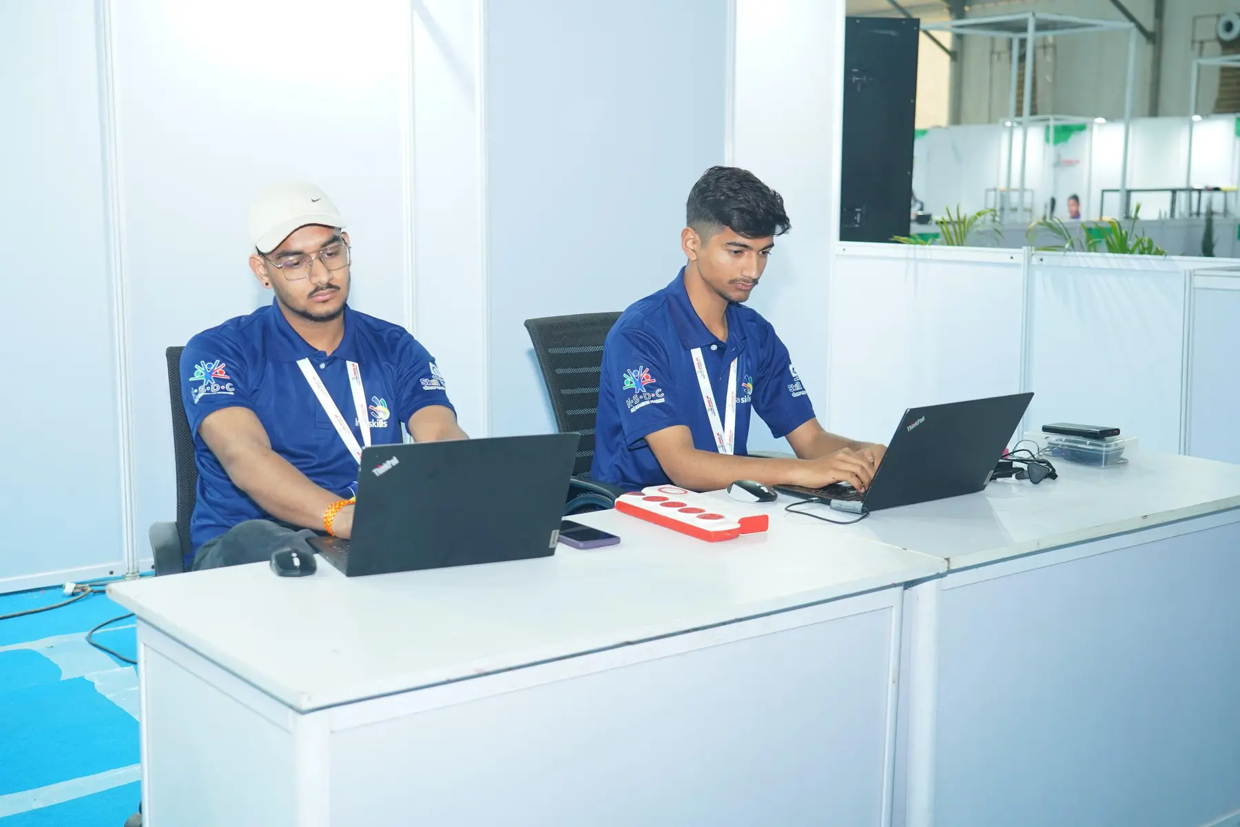 Competitors working at computers during IndiaSkills